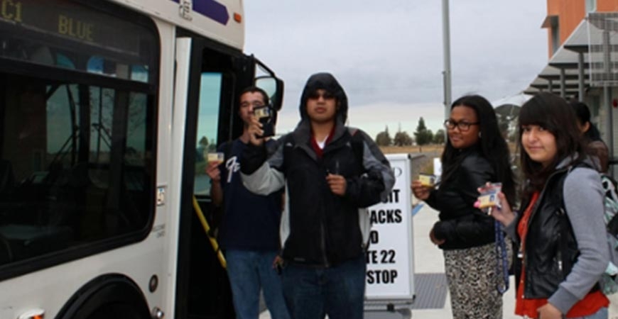 students taking the CatTracks bus for free with their CatCard
